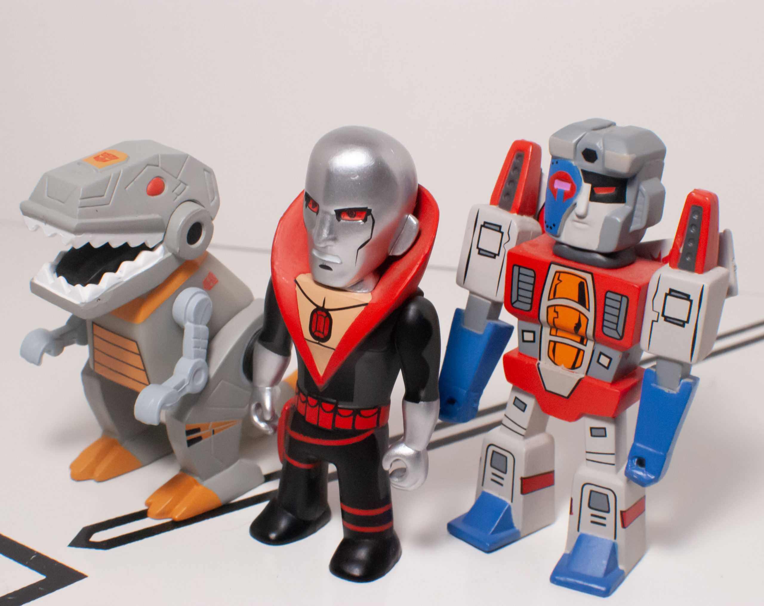 Bot Reviews: Transformers vs. G.I Joe Vinyl Mini Series Destro, Starscream and Grimlock